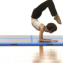 vidaXL Gymnastiekmat met pomp opblaasbaar 300x100x10 cm PVC blauw