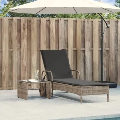 vidaXL Ligbed met wielen en kussen poly rattan grijs
