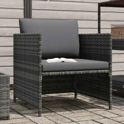 vidaXL Tuinbank met kussens poly rattan grijs